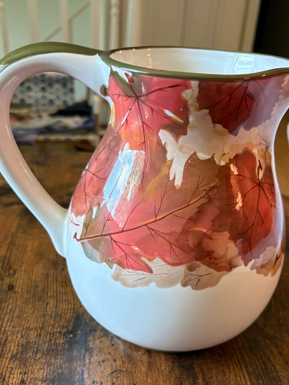 Source Unknown White Ceramic Pitcher with Red and Brown Leaf Motif